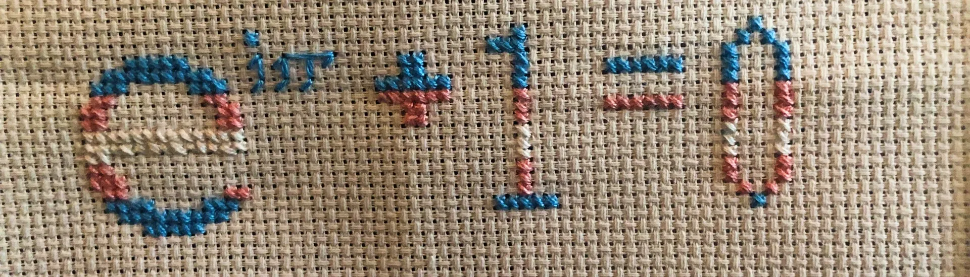A cross stitch of the Euler Identity in colors of the transgender pride flag.